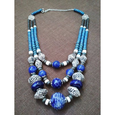 Necklace Patsyorka of ceramic beads turquoise 3 threads