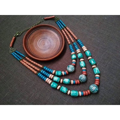 Necklace Patsyorka of ceramic beads turquoise 3 threads